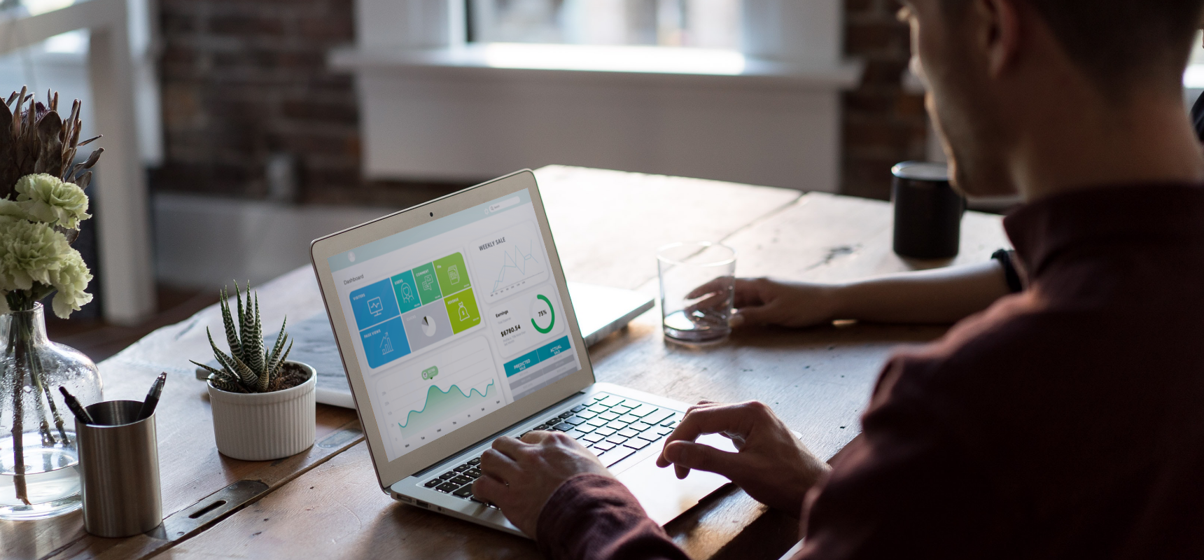 Merchandiser Reviewing E-Commerce Website Analytics After Making Product Search Rules and Adjustments